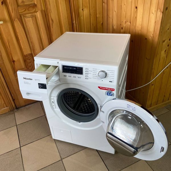 Б/у Стирально-сушильная машина Miele WT1 Wasch/Dry (PowerWash 2.0) 177 фото